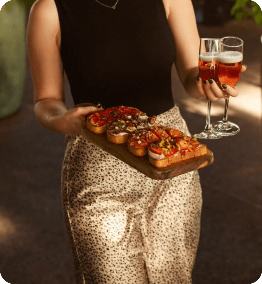 woman participates in Postino WineCafe's Battle of the Bruschetta campaign via SimpleTexting's text-to-vote